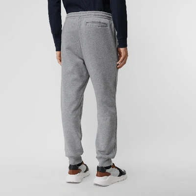 Shop Burberry Chequer Ekd Cotton Trackpants In Pale Grey Melange
