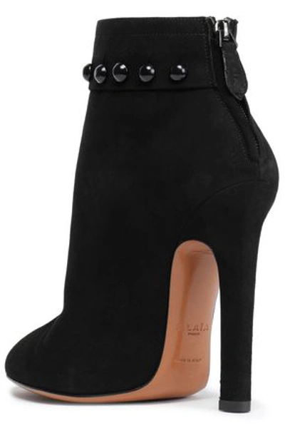 Shop Alaïa Button-embellished Suede Ankle Boots In Black