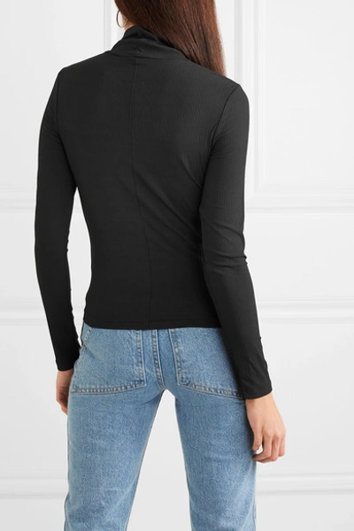 Shop Kith Brynn Ribbed Stretch-jersey Turtleneck Top In Black