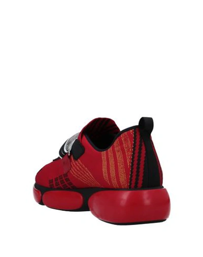 Shop Prada Sneakers In Red
