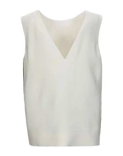 Shop Burberry Tops In Ivory