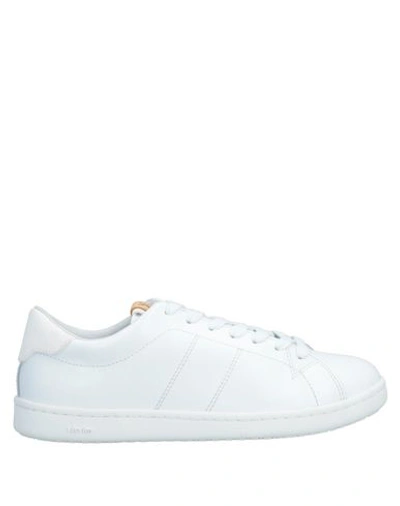 Shop Visvim Sneakers In White