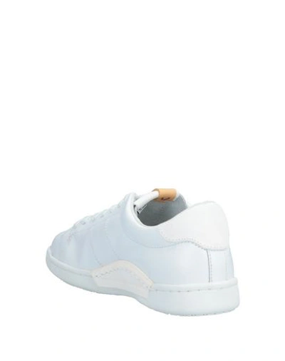 Shop Visvim Sneakers In White