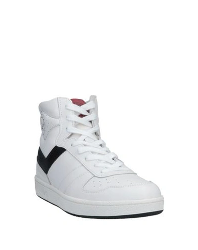 Shop Pony Sneakers In White