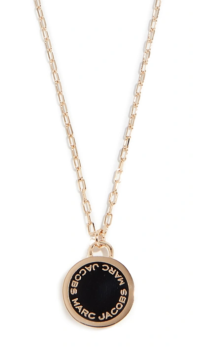 Shop Marc Jacobs Logo Disc Pendant Necklace In Black/oro