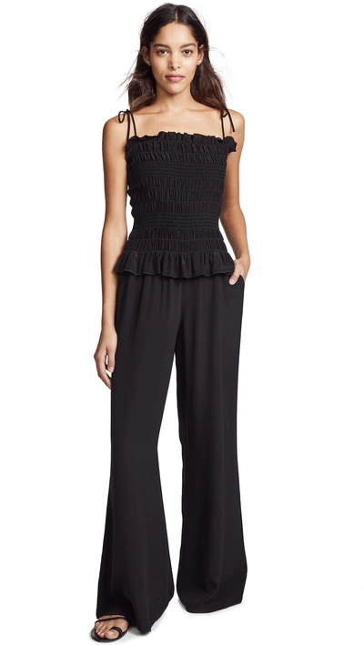 Shop Tory Burch Smocked Jumpsuit In Black