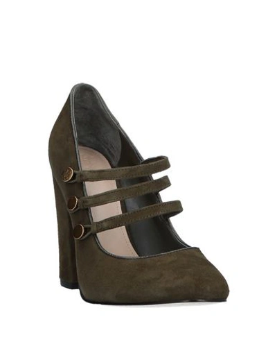 Shop Guess Pumps In Military Green