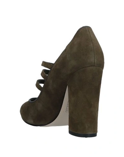 Shop Guess Pumps In Military Green