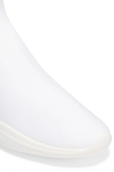 Shop Prada Logo-embellished Stretch-knit Slip-on Sneakers In White