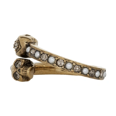 Shop Alexander Mcqueen Gold Twin Skull Ring In 7124 0448