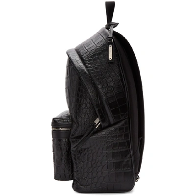 city backpack in crocodile-embossed leather