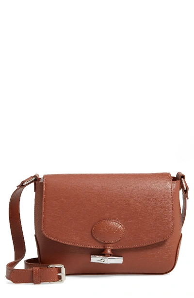 Shop Longchamp Roseau Leather Crossbody Bag - Brown In Caramel