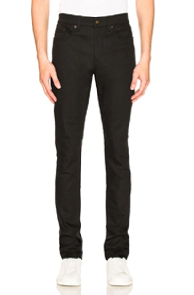 Shop Saint Laurent 5 Pocket Skinny Jeans In Black