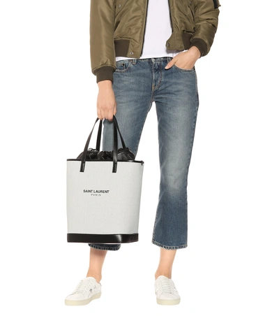 Shop Saint Laurent Teddy Canvas And Leather Bucket Bag In White