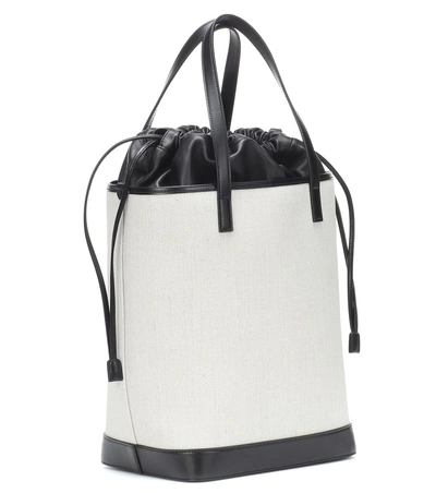 Shop Saint Laurent Teddy Canvas And Leather Bucket Bag In White