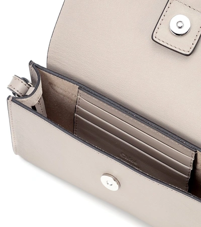 Shop Chloé Faye Mini Leather Wallet Bag In Grey