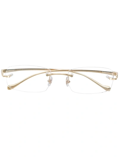 Shop Cartier Rectangle Frame Glasses In Gold