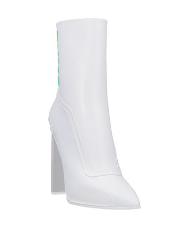 Fenty X Puma Fenty Puma X Rihanna Leather Pointed Toe Racing Booties In White Modesens