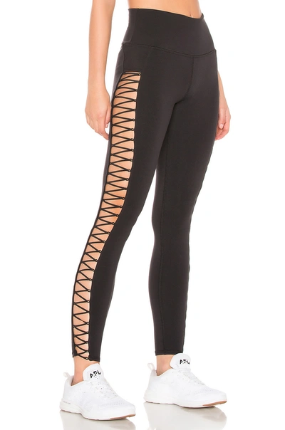 Shop Alo Yoga Highline Lace Up Legging In Black