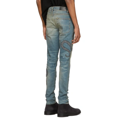Amiri Skinny-fit Appliquéd Distressed Stretch-denim Jeans - Light Denim In  Indwh | ModeSens