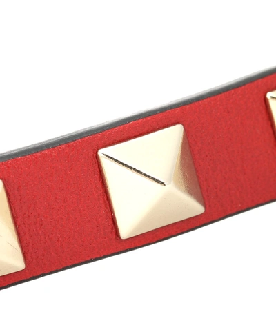 Shop Valentino Rockstud Leather Bracelet In Red