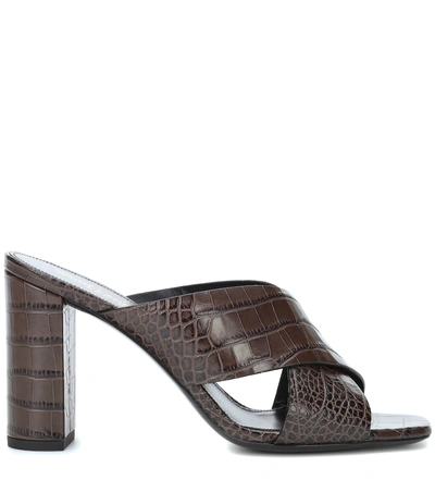 Shop Saint Laurent Loulou 100 Embossed Leather Mules In Brown