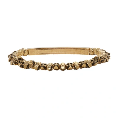Shop Alexander Mcqueen Gold Mini Skull Bracelet In 0448 Gold