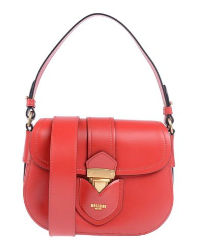Shop Moschino Handbags In Brick Red