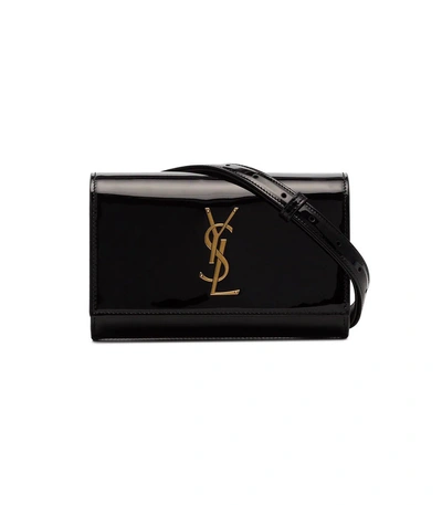 Shop Saint Laurent Kate Patent Leather Belt Bag In Black