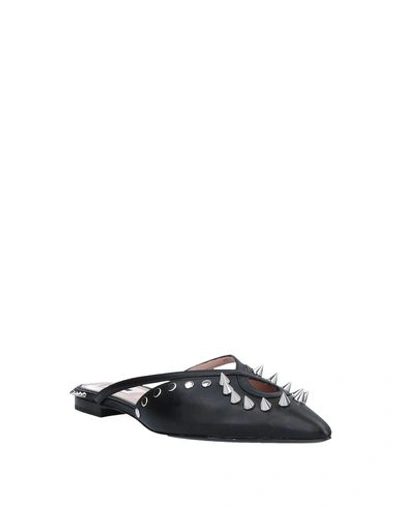 Shop Moschino Mules And Clogs In Black