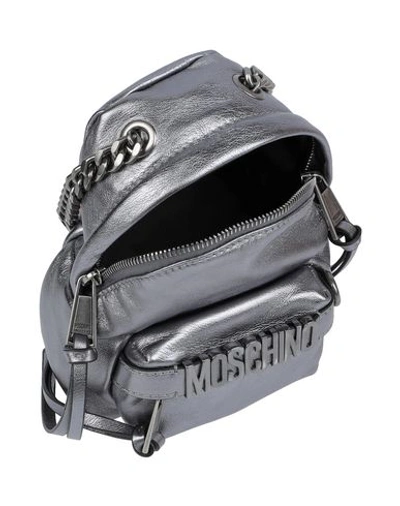 Shop Moschino Cross-body Bags In Lead