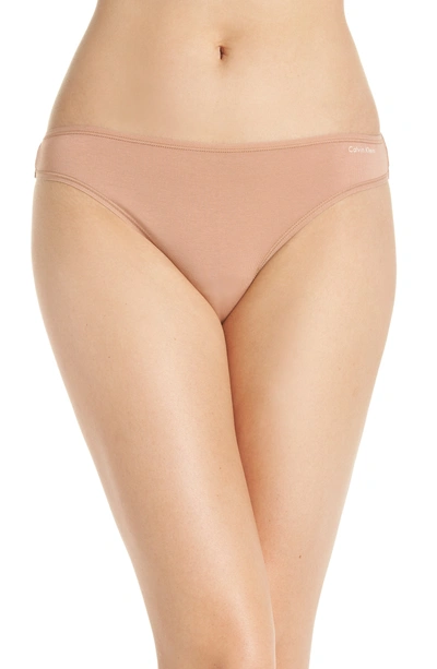 Shop Calvin Klein Form Thong In Warm Camel