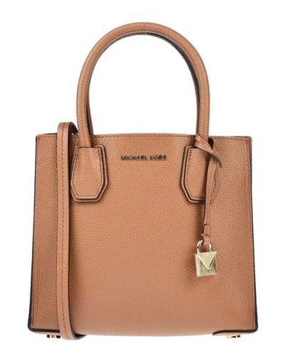 Shop Michael Michael Kors Handbag In Tan