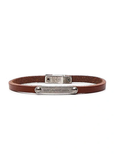Shop Saint Laurent Logo Plaque Leather Bracelet In Brown