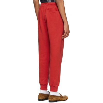 Shop Burberry Red Chequer Ekd Munley Track Pants In Abngpmred