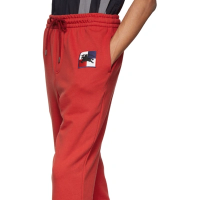 Shop Burberry Red Chequer Ekd Munley Track Pants In Abngpmred