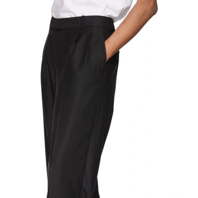 Shop Burberry Black Thruloe Trousers In P81300black