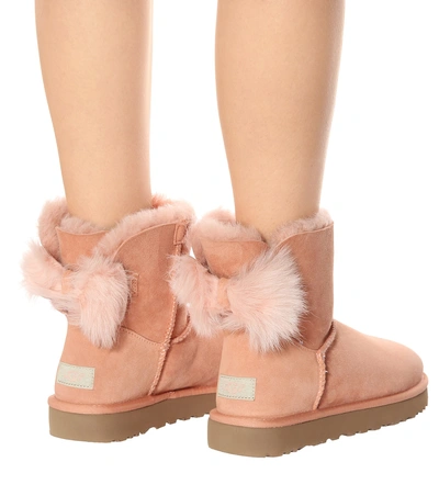 Ugg Fluff Bow Mini Ankle Boots In Pesca | ModeSens
