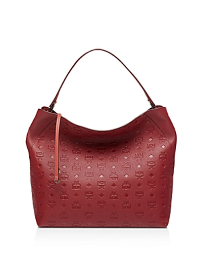 Shop Mcm Klara Monogram Large Leather Hobo In Ruby Tan Red/gold