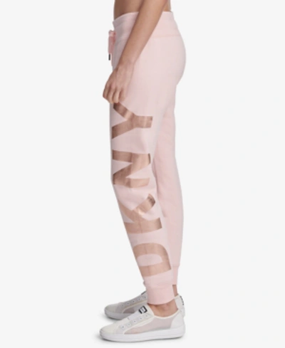 Shop Dkny Sport Logo Graphic Jogger Pants In Rosewater