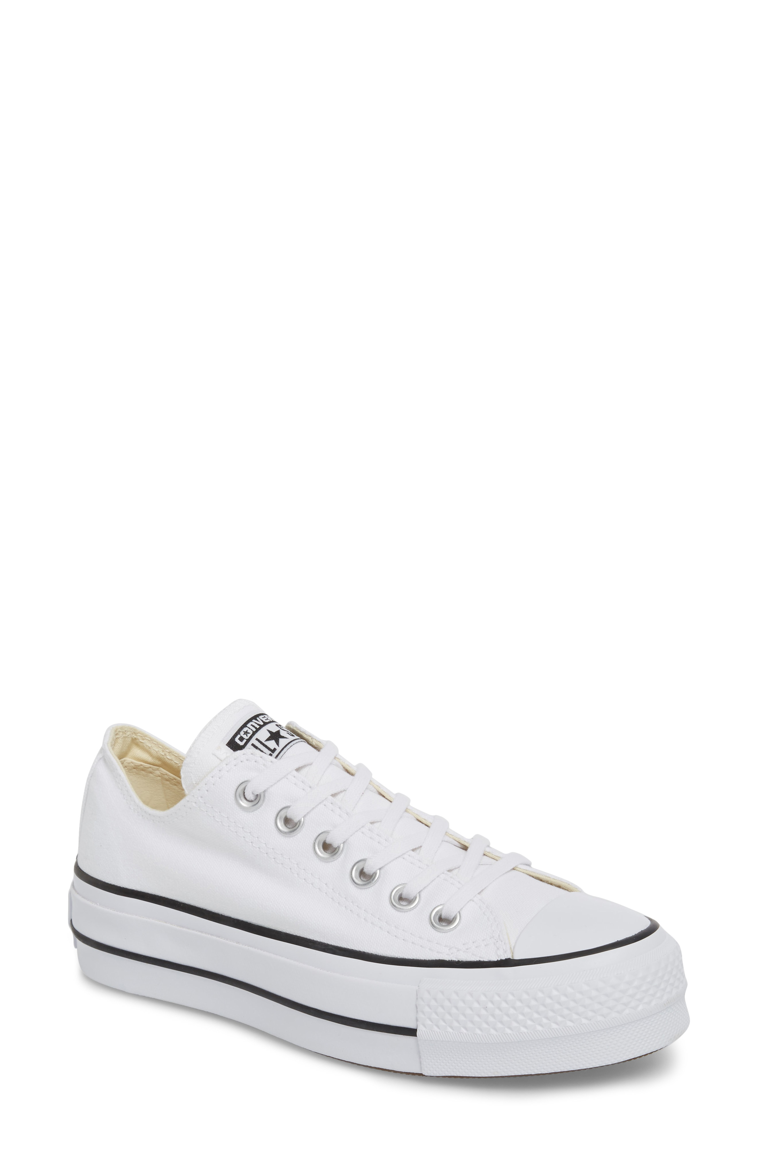 half white half black platform converse