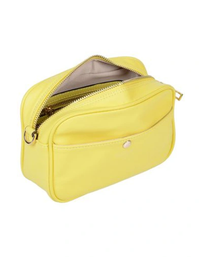 Shop Avenue 67 Cross-body Bags In Yellow