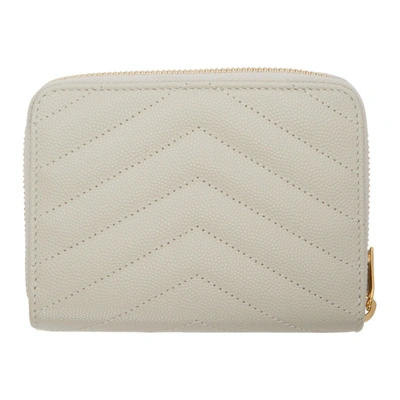 Shop Saint Laurent Off-white Monogramme Compact Zip Around Wallet In 9207 White