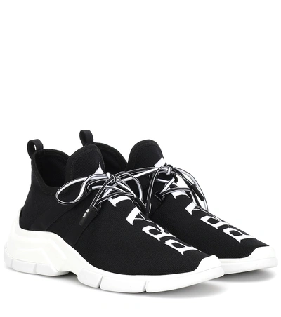 Shop Prada Xy Knit Sneakers In Black