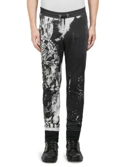 Shop Balmain Graphic-print Cotton Sweatpants In White Black