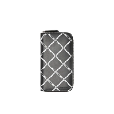 Shop Burberry Link Print Leather Ziparound Wallet In Black/chain