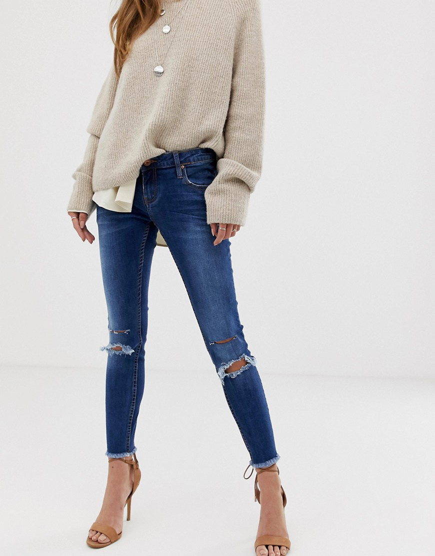 navy ripped skinny jeans