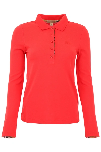Shop Burberry Long-sleeved Polo Shirt In Bright Red (red)
