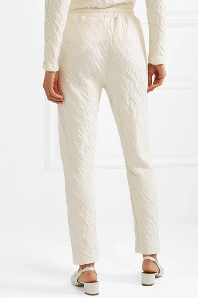 Shop Mansur Gavriel Crinkled Cotton-jersey Tapered Pants In Cream