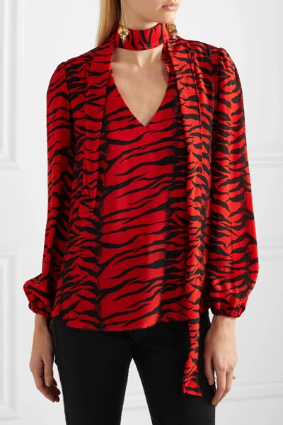 Shop Rixo London Moss Pussy-bow Tiger-print Silk-crepe Blouse In Red